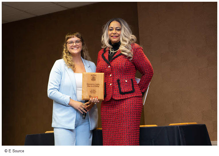 MGLW accepting its award