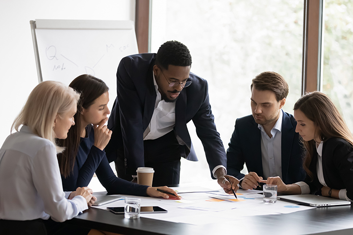People collaborating around table