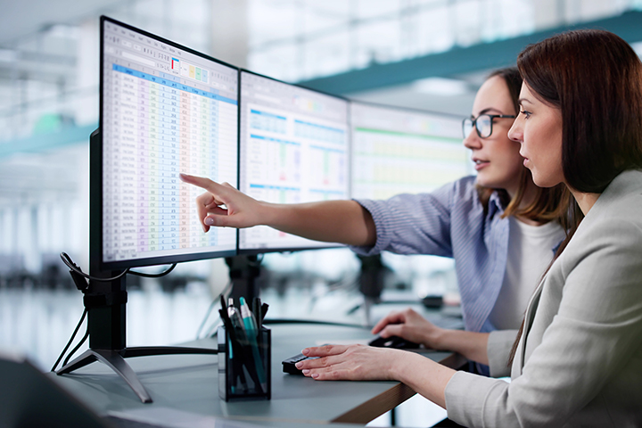 People analyzing water loss data