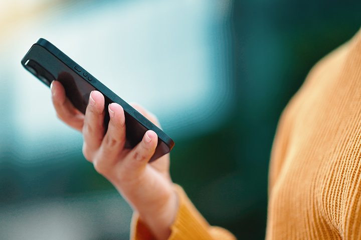 Person using app on smartphone