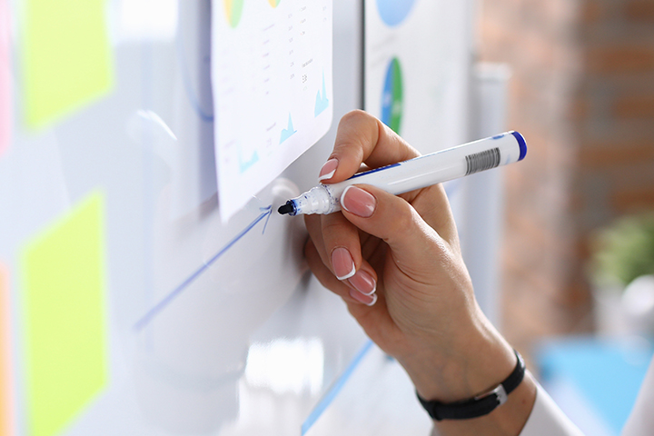 Worker using whiteboard