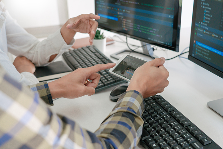 People working at desktop computer