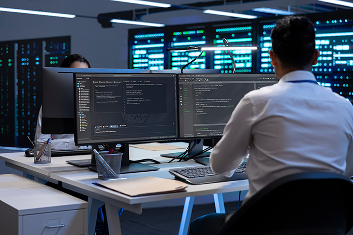 Worker at computer servers