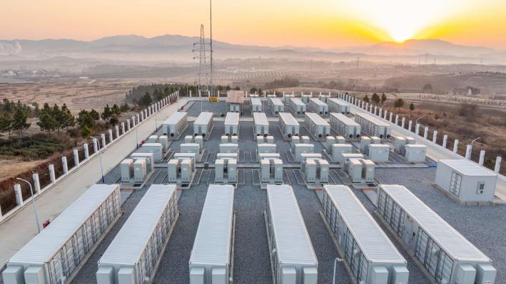 An energy storage station at sunset