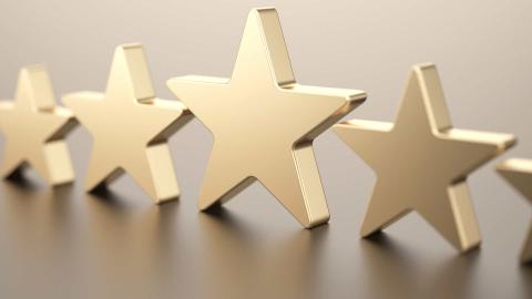 gold stars on a flat surface